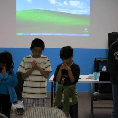 Children praying at the Good News Club (every Friday at 7:30 pm at Chinese Community Church of South Bay)
